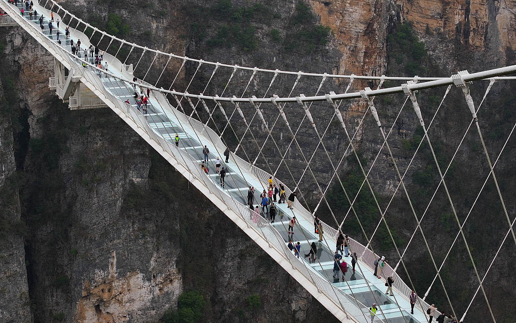 A photo taken on March 22, 2024 shows the view of the glass-bottom bridge in the Zhangjiajie Grand Canyon Scenic Area, Hunan Province, China. /CFP