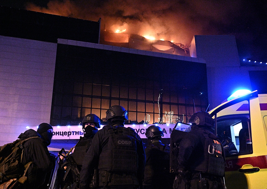 Law enforcement officers are seen near the Crocus City Hall concert venue following a mass shooting near Moscow, Russia, March 22, 2024. /CFP