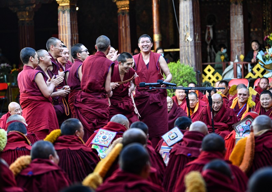 Monks attend a debate activity at Jokhang Temple in Lhasa, capital of southwest China's Xizang Autonomous Region, April 23, 2023. /Xinhua