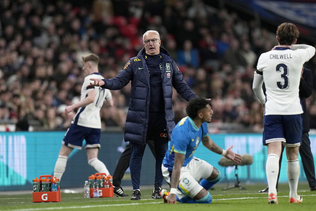 Brazil coach Dorival Junior (C) reacts during their clash with England at Wembley Stadium in London, England, March 23, 2024. /CFP