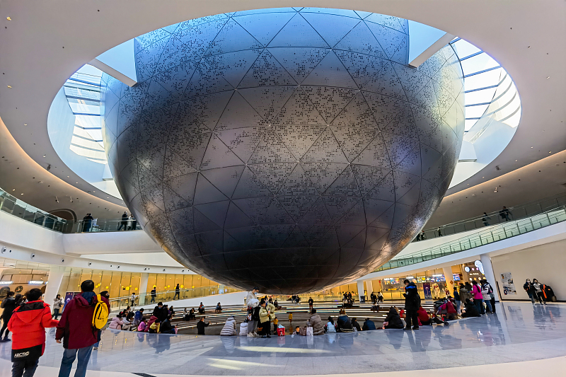 A file photo shows people visiting the Shanghai Astronomy Museum in Shanghai. /CFP