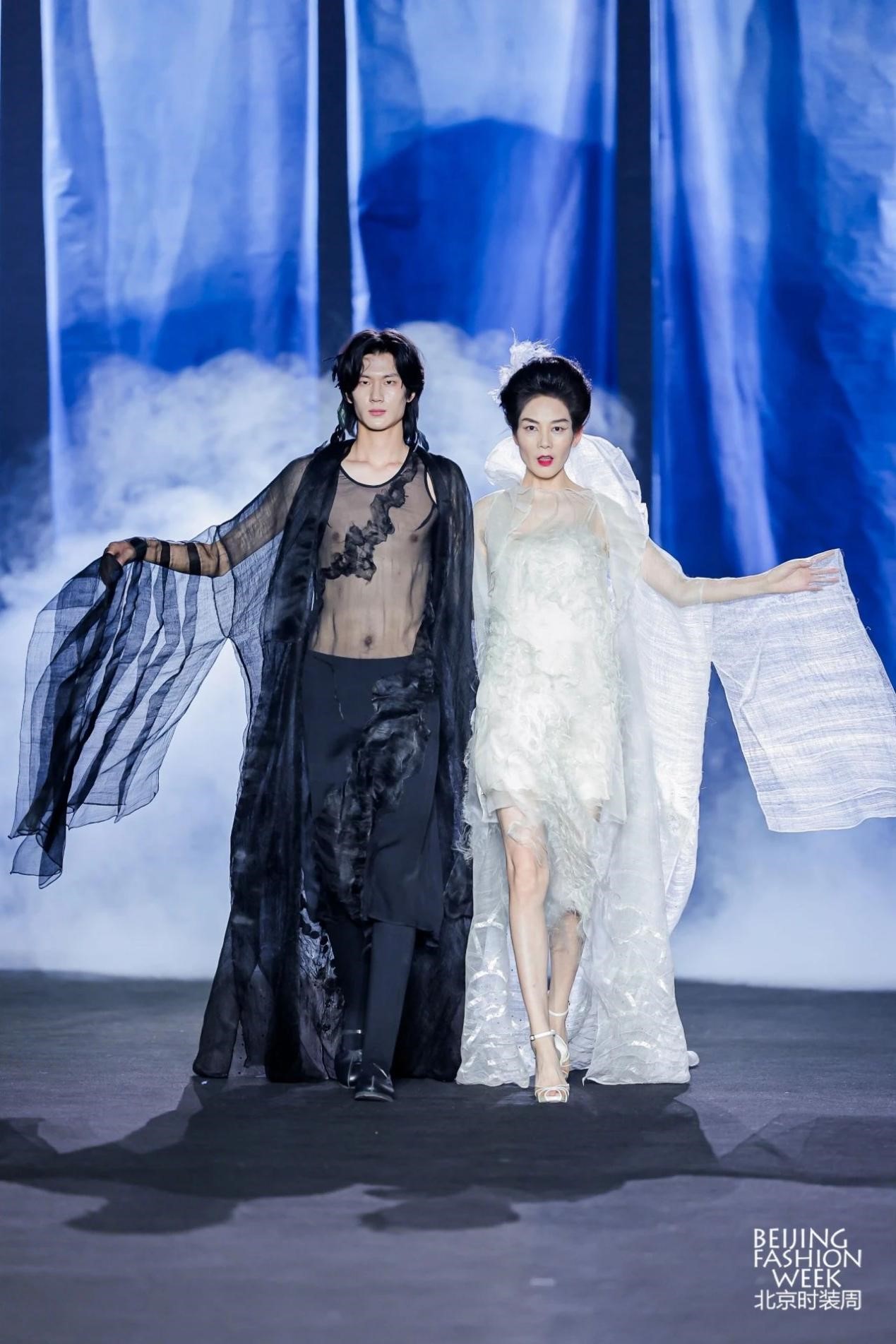 Models showcase fashion designer Li Wei's latest collection at the closing show of the autumn/winter 2024 Beijing Fashion Week on March 22, 2024. /Photo provided to CGTN 