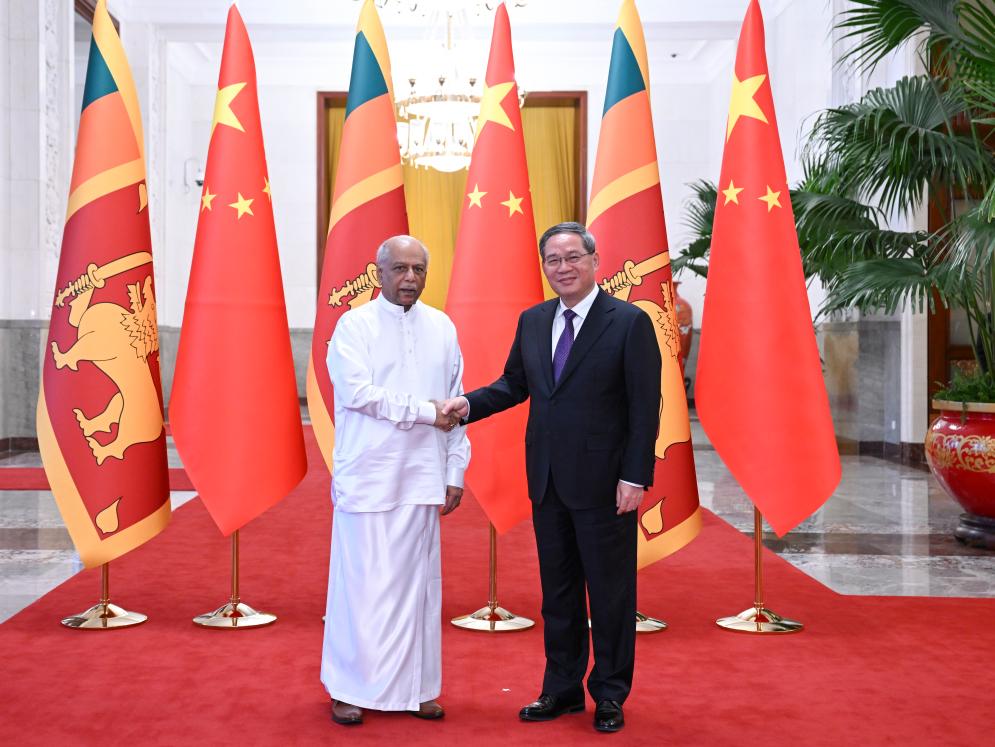 Chinese Premier Li Qiang (R) meets with Sri Lankan Prime Minister Dinesh Gunawardena, who is on an official visit to China, at the Great Hall of the People in Beijing, China, March 26, 2024. /Xinhua