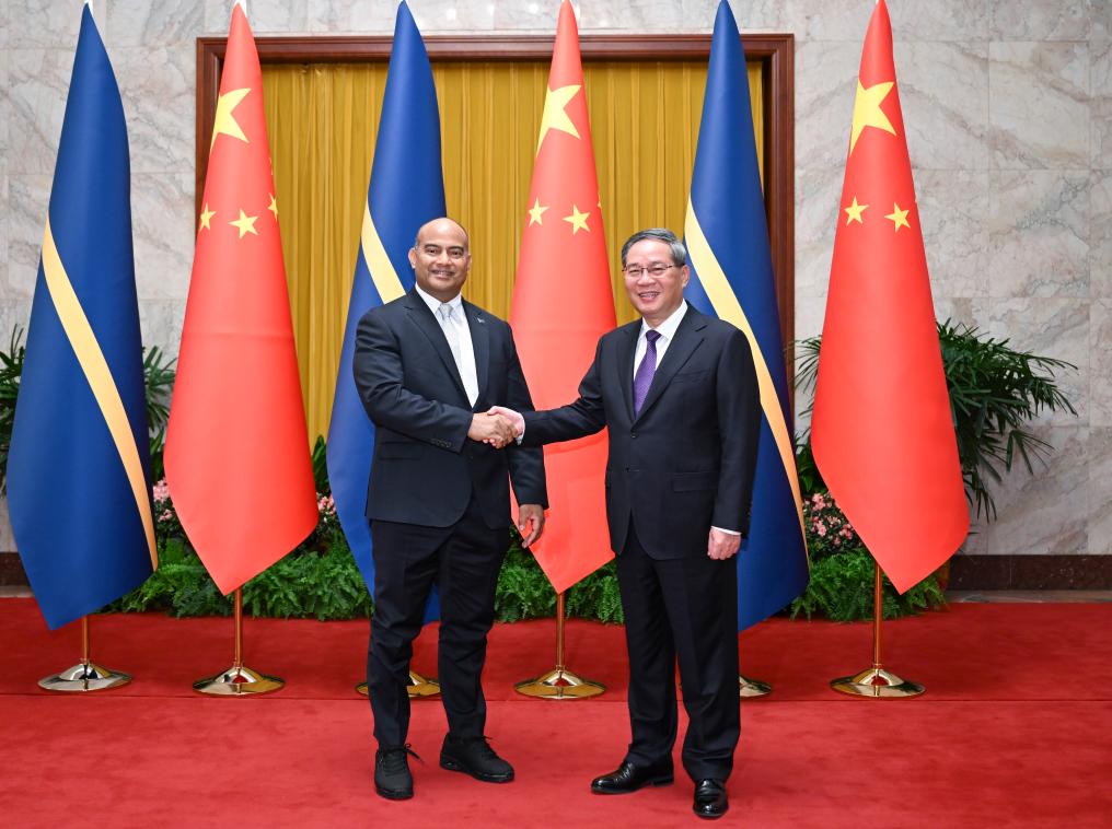 Chinese Premier Li Qiang (R) meets with Nauruan President David Adeang, who is on a state visit to China, at the Great Hall of the People in Beijing, China, March 26, 2024. /Xinhua