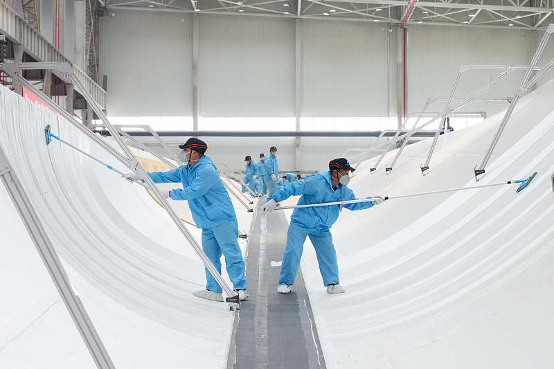 Engineers build wind turbine blades in Dongfang City, south China's Hainan Province, February 27, 2024. /CFP