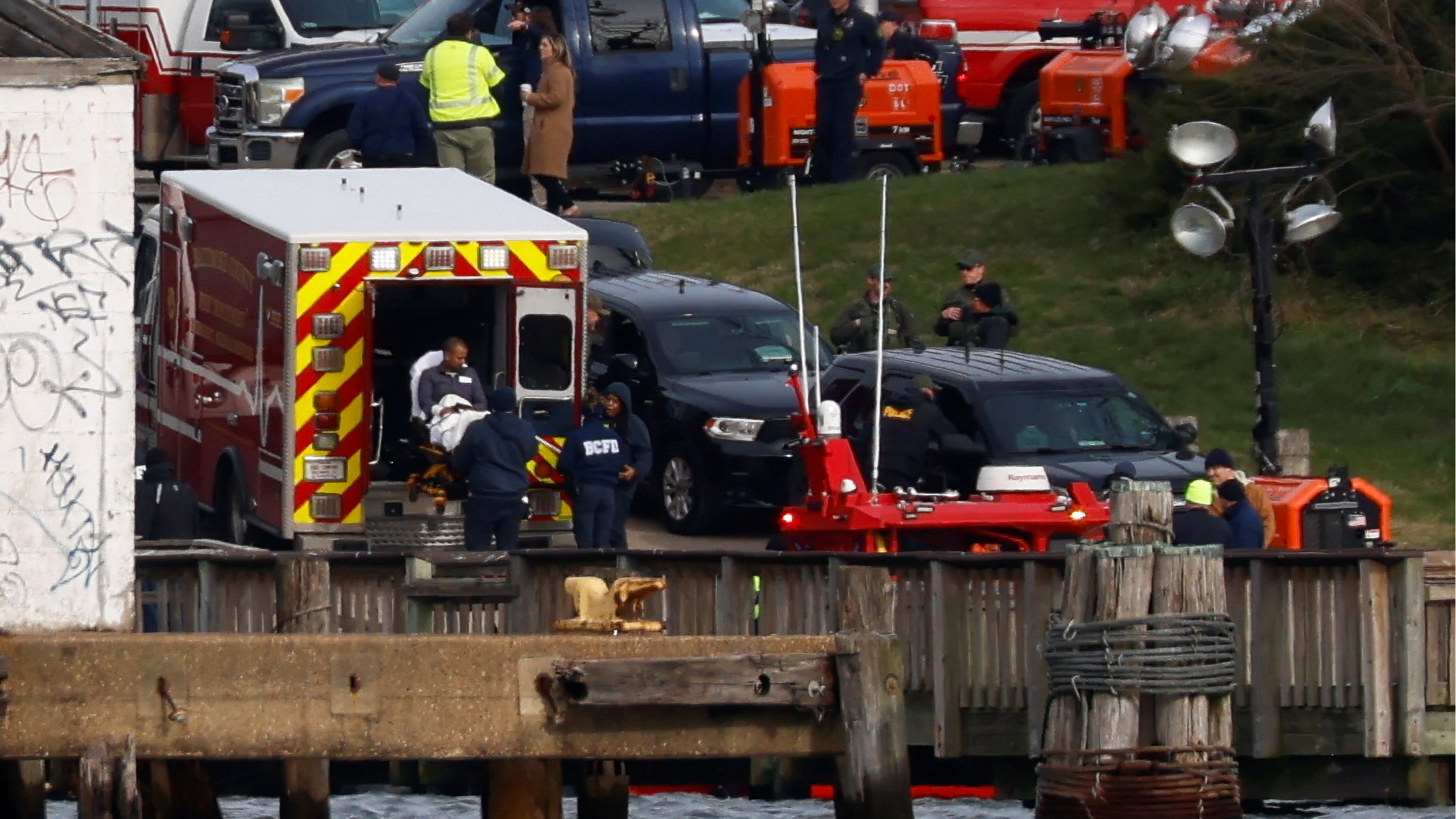 An injured sailor from the cargo vessel, the Dali, is put in an ambulance after getting taken off the ship following the Francis Scott Key Bridge collapse in Baltimore, Maryland, U.S., March 26, 2024. /Reuters