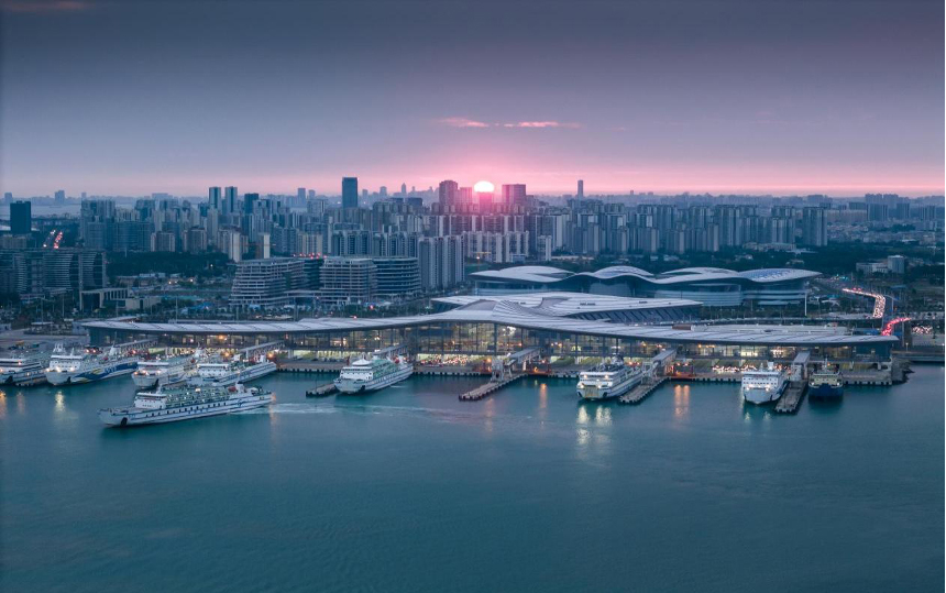 The sun rises over the Xinhai Port in Haikou, Hainan Province. /Photo provided to CGTN by Mao Zehao