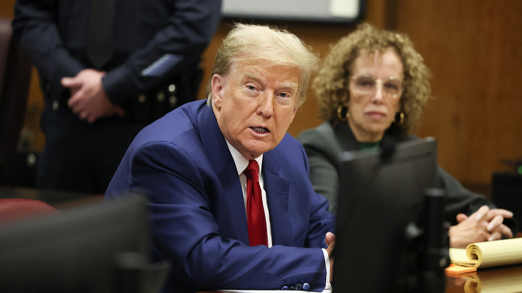 Former U.S. President Donald Trump sits in a courtroom at a hearing in his criminal case on charges stemming from hush money paid to a porn star in New York City, U.S., March 25, 2024. /CFP