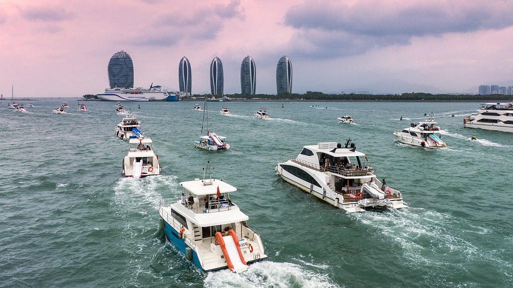 Tourists enjoy a cruise on yachts in Sanya City, south China's Hainan Province, March 9, 2024. /CFP
