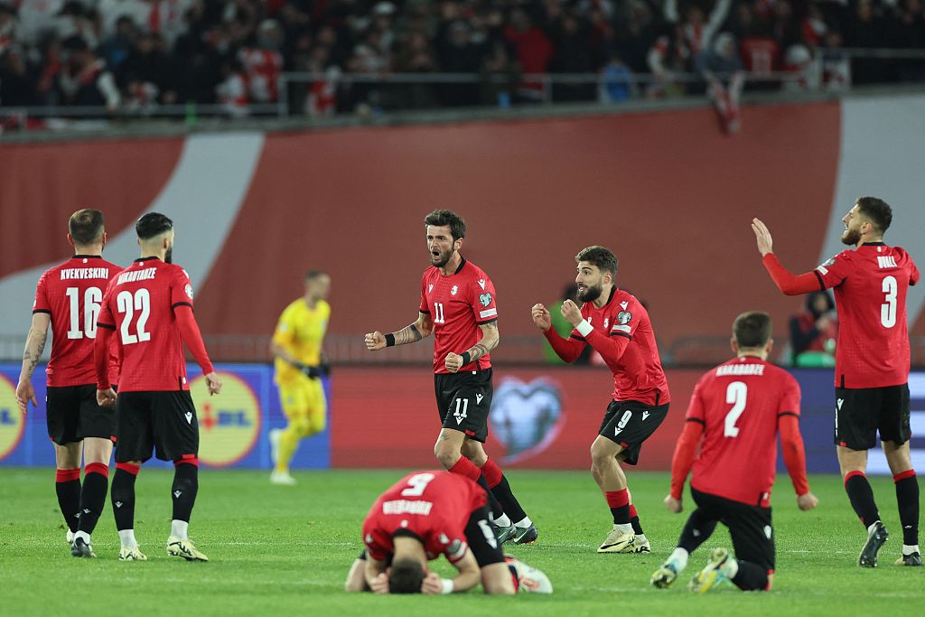 Players of Georgia celebrate after beating Greece in the 2024 UEFA European Championship qualification playoff final at Boris Paichadze Dinamo Arena in Tbilisi, Georgia, March 26, 2024. /CFP