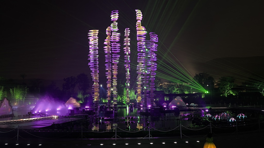 A light show is seen on a square in Nianhuawan tourist town in Wuxi, Jiangsu Province on September 29, 2023. /CFP