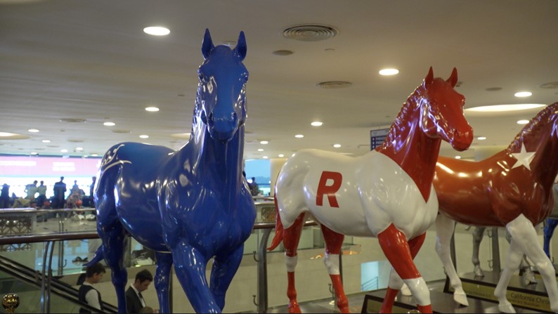 Sculptures of past champion horses from the Dubai World Cup are on display inside the Meydan Racecourse. /CGTN