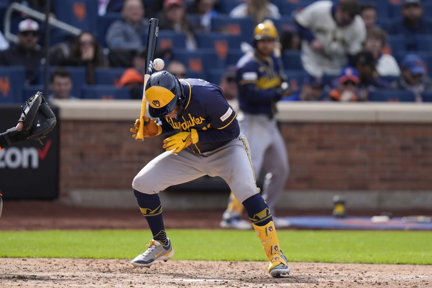 Rhys Hoskins, designated hitter of the Milwaukee Brewers, ducks a pitch from Yohan Ramirez of the New York Mets in the game against the Milwaukee Brewers at Citi Field in New York City, March 30, 2024. /AP