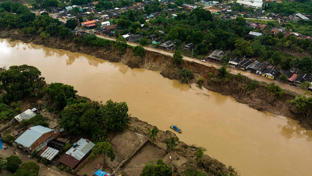 An aerial view of a river swollen by heavy rains in Cobija, Bolivia, March 4, 2024. /CFP