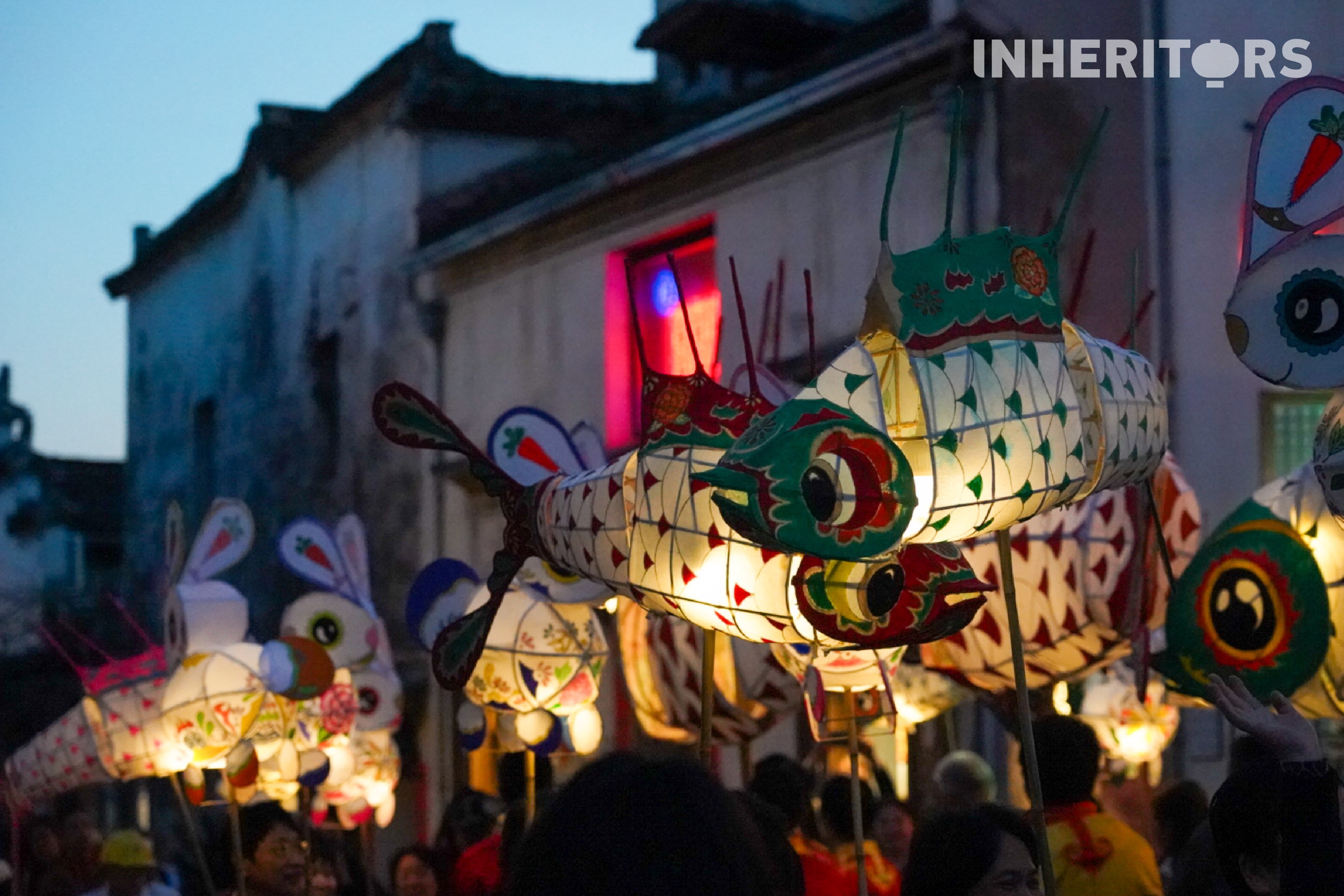 Local people and visitors attend a fish lantern parade in Hongcun Village, Huangshan City, Anhui Province in this undated photo. /CGTN