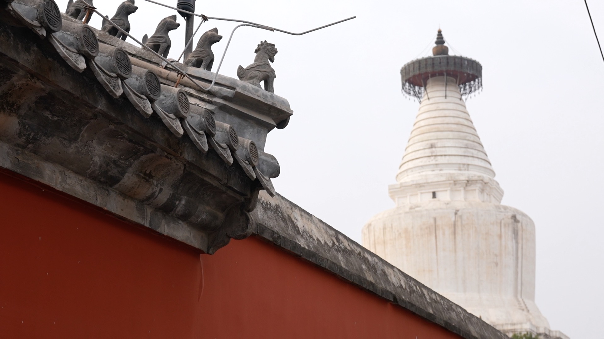 A shot of Miaoyin Temple's White Pagoda in the heart of Beijing /CGTN