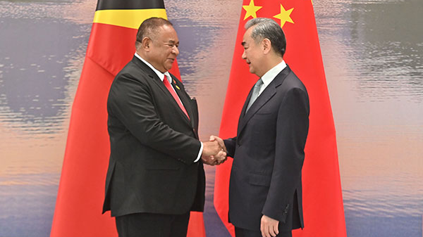 Chinese Foreign Minister Wang Yi (R), also a member of the Political Bureau of the CPC Central Committee, meets with Bendito dos Santos Freitas, minister of Foreign Affairs and Cooperation of Timor-Leste, in south China's Guangxi Zhuang Autonomous Region, April 4, 2024. /Chinese Foreign Ministry