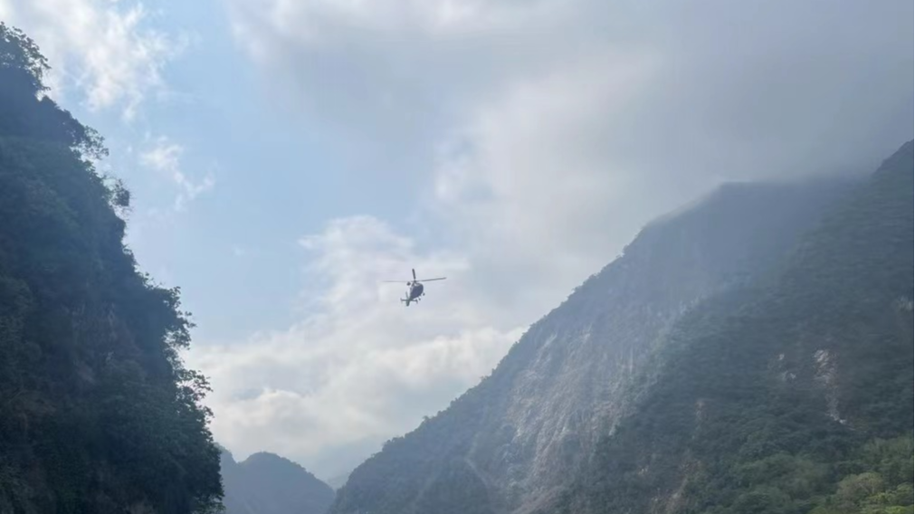 A rescue helicopter is seen above the Taroko park region in Hualien County, southeast China's Taiwan, April 4, 2024. /Xinhua