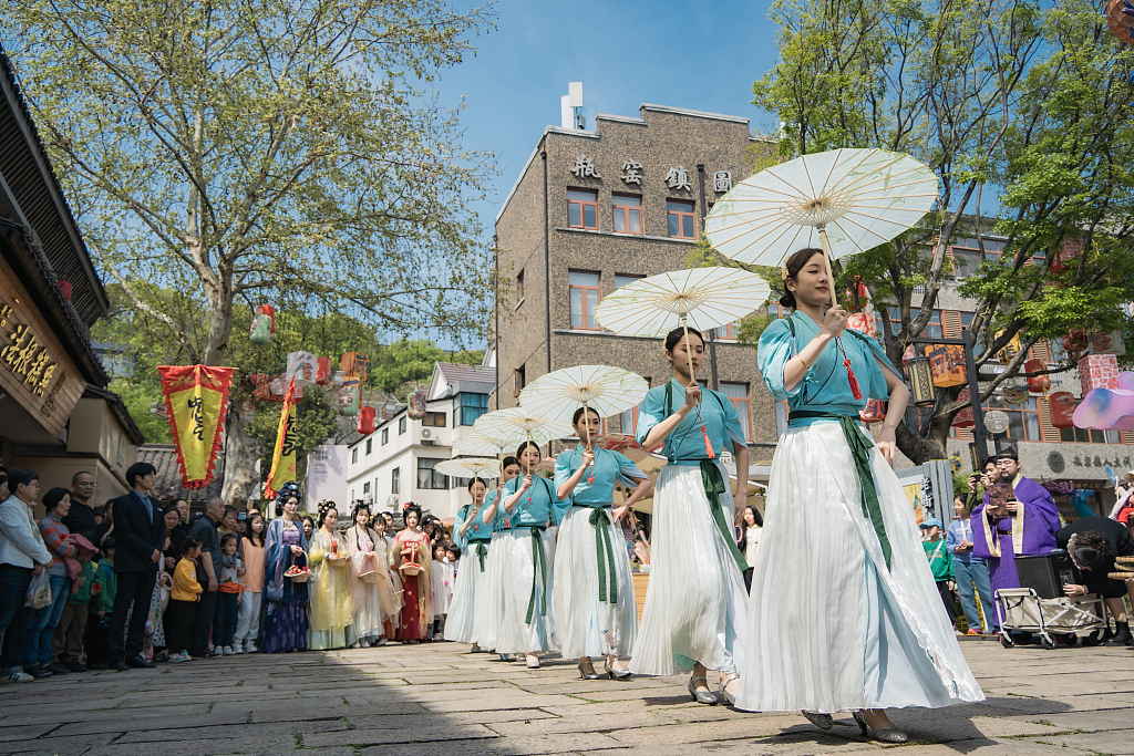 A slew of celebrative activities are hosted to honor silkworms in Hangzhou, Zhejiang Province on April 5, 2024. /CFP