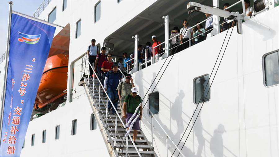 Passengers disembark from the vessel Sansha II after its maiden voyage at Yongxing Island of Sansha City, south China's Hainan Province, August 21, 2019. /CFP