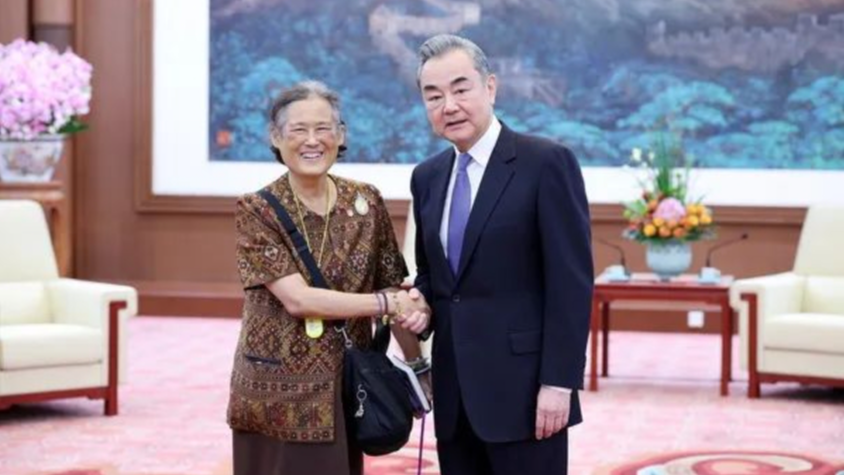 Chinese Foreign Minister Wang Yi shakes hands with Princess Maha Chakri Sirindhorn of the Kingdom of Thailand in Beijing, April 8, 2024. /Chinese Foreign Ministry