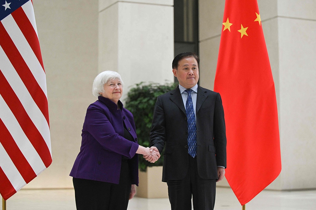 U.S. Treasury Secretary Janet Yellen shakes hands with People's Bank of China Governor Pan Gongsheng during her visit to the central bank's headquarters in Beijing on April 8, 2024. /CFP