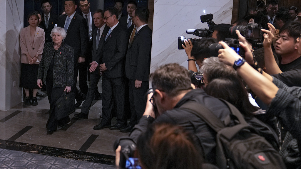 U.S. Treasury Secretary Janet Yellen arrives at the White Swan Hotel to have a dinner meeting hosted by Chinese Vice Premier He Lifeng, as journalists film and take photos of her, in southern China's Guangdong Province, April 5, 2024. /CFP