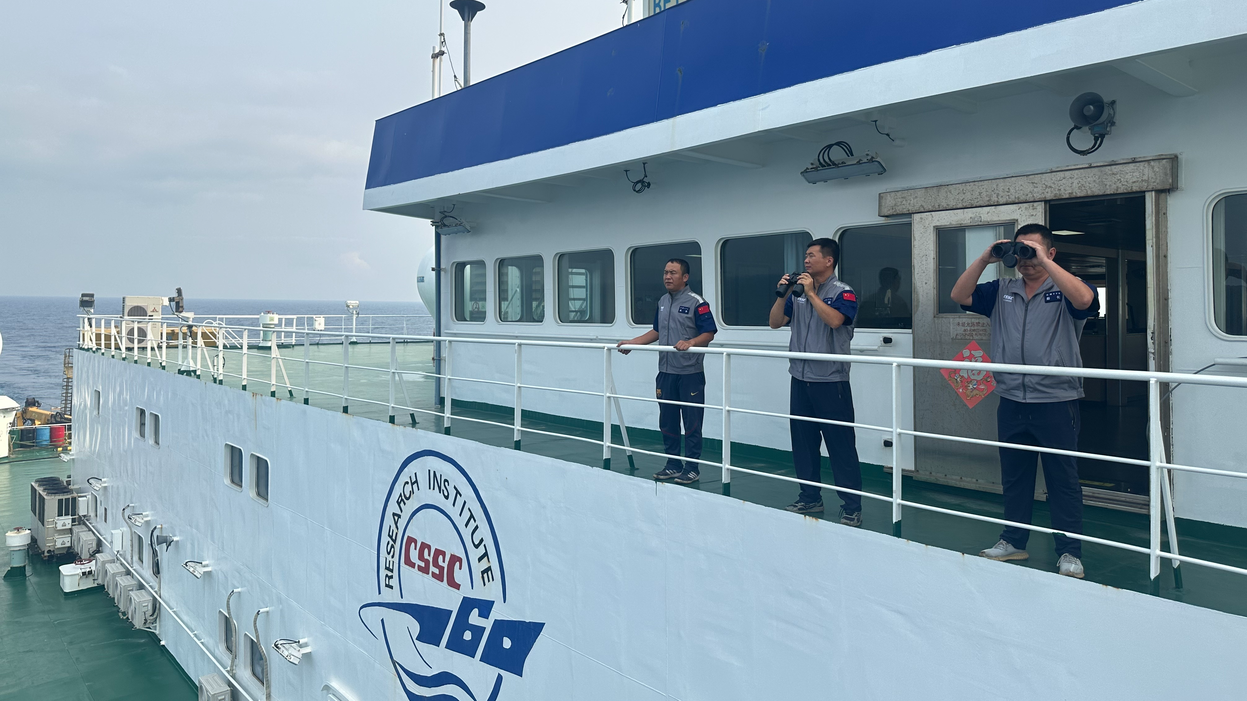 Search and rescue crews work on a China State Shipbuilding Corporation vessel in Hainan, April 10, 2024. /CMG