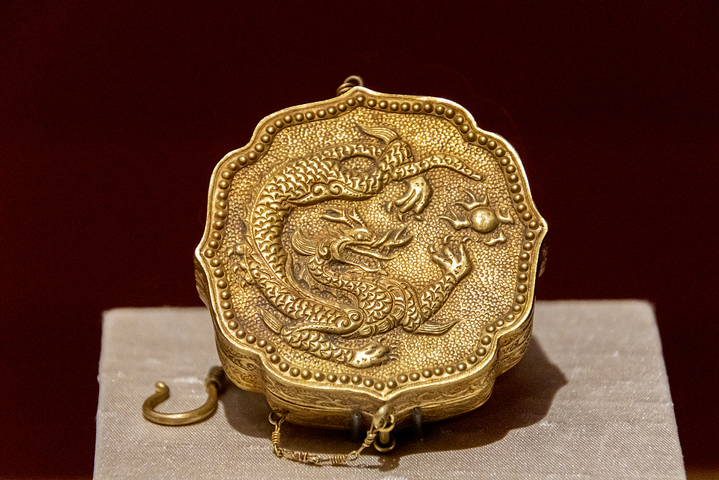 A gold box with a dragon pattern of the Liao Dynasty (907-1125) is displayed at the National Museum of China in Beijing on February 10, 2024. /CFP