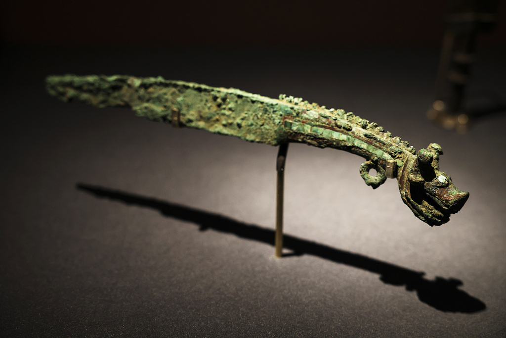 A dragon-headed bronze knife of the Shang Dynasty (around 1600-1046 B.C.) is displayed at the Palace Museum on January 10, 2024. /CFP