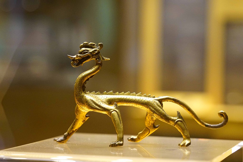 A gilded bronze dragon of the Tang Dynasty (618-907) is displayed at Xi'an Museum in Shaanxi Province on January 30, 2024. /CFP