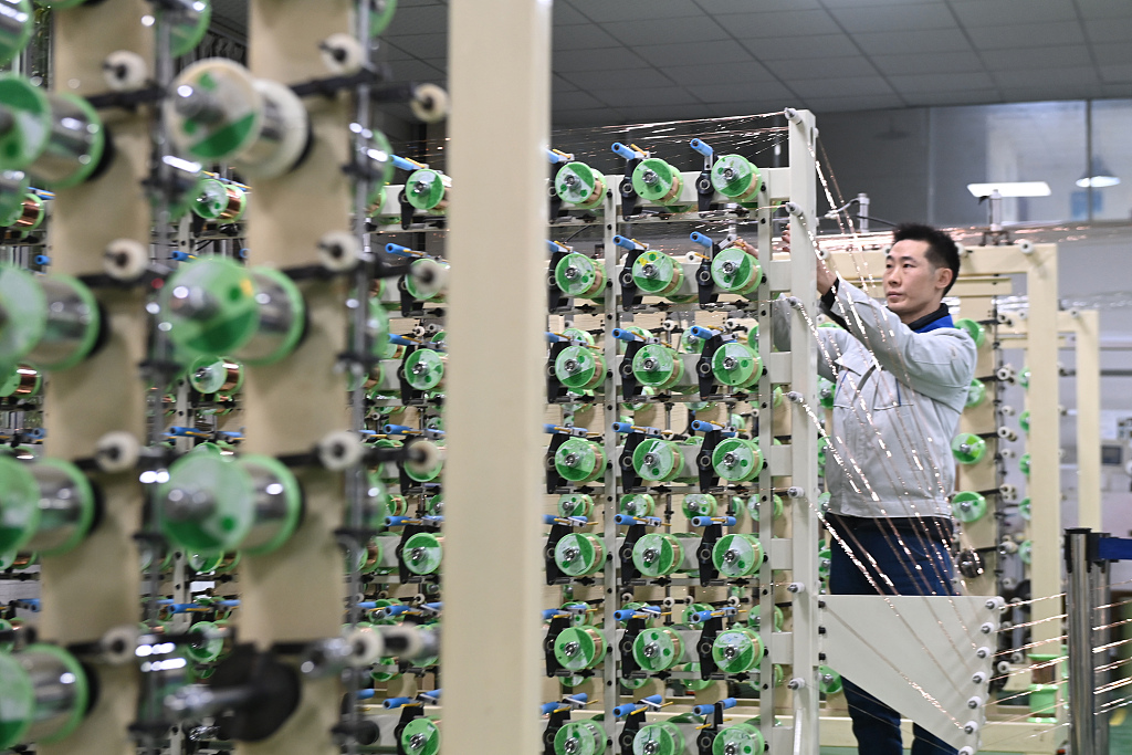 A busy production line at a Jinlong Technology Co. factory in Chongqing, China, March 19, 2024. /CFP