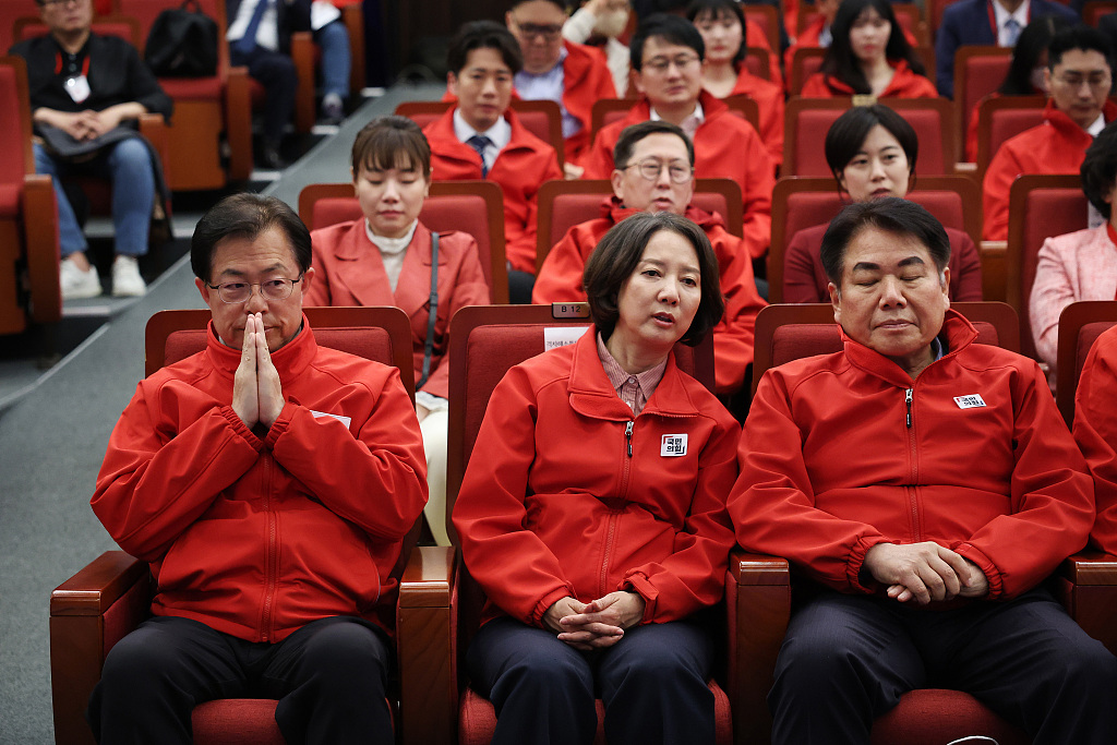 Members of the South Korean ruling People Power Party wait for news on the results of exit polls for the parliamentary election at the National Assembly on April 10, 2024 in Seoul, South Korea. /CFP