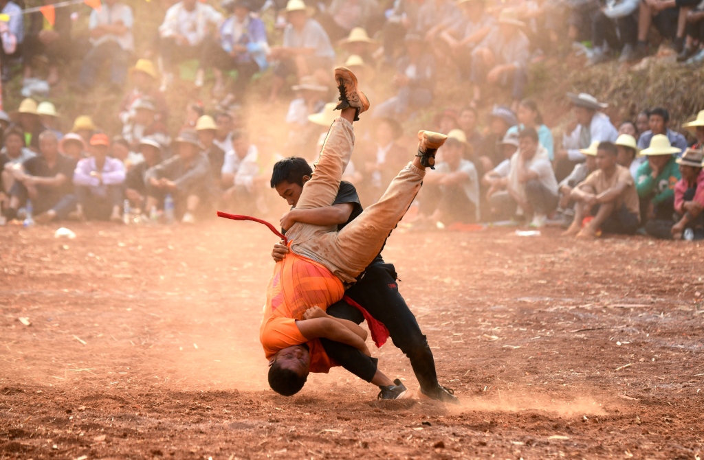A moment of a wrestling competition is captured at a village in Mile City, Yunnan Province on April 11, 2024. /CFP 
