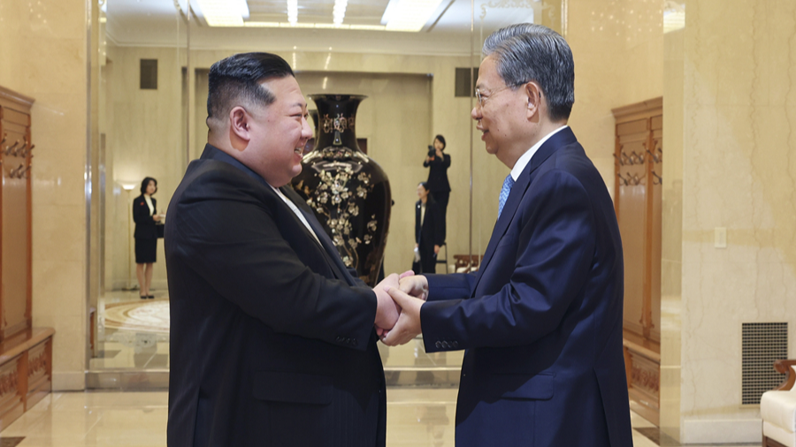 Zhao Leji (R), a member of the Standing Committee of the Political Bureau of the Communist Party of China Central Committee and chairman of China's National People's Congress Standing Committee, shakes hands with Kim Jong Un, general secretary of the Workers' Party of Korea and president of the State Affairs of the Democratic People's Republic of Korea (DPRK), in Pyongyang, DPRK, April 13, 2024. /Xinhua