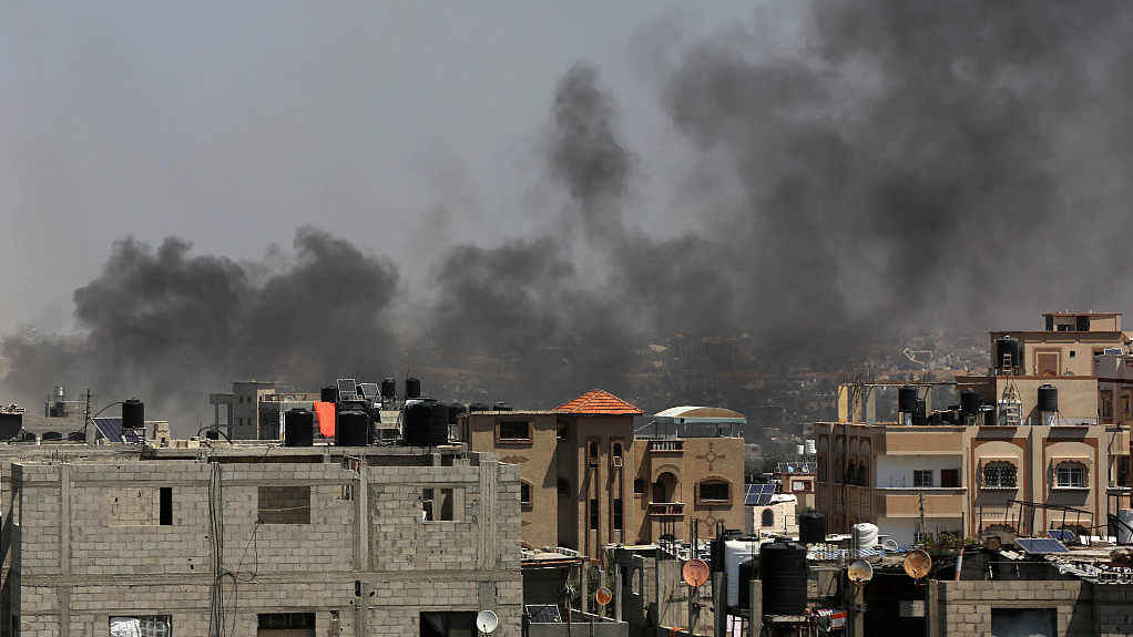 Smoke rises as the Israeli forces raid the Nuseirat refugee camp in Deir Al Balah, Gaza, April 12, 2024. /CFP