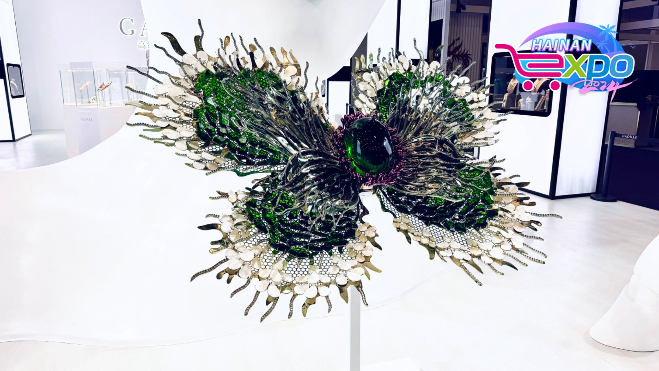 A butterfly made of gems is seen at the fourth China International Consumer Products Expo, Haikou City, south China's Hainan Province, April 12, 2024. Guo Meiping/CGTN