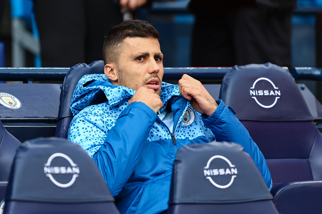Rodri of Manchester City sits on the substitutes bench before the Premier League match between Manchester City and Luton during their Premier League match at the Etihad Stadium in Manchester, England, April 13, 2024. /CFP