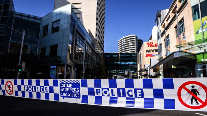 Police tape is seen in front of a roadblock outside the Westfield Bondi Junction shopping mall in Sydney, Australia, April 14, 2024. /CFP