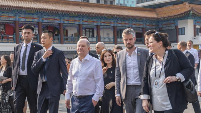 Federal Chancellor of Germany Olaf Scholz visits Yuzhong District in southwest China's Chongqing Municipality, April 14, 2024. /Xinhua