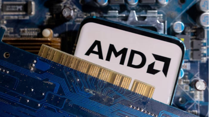 A smartphone with a displayed AMD logo is placed on a computer motherboard, March 6, 2023. /Reuters