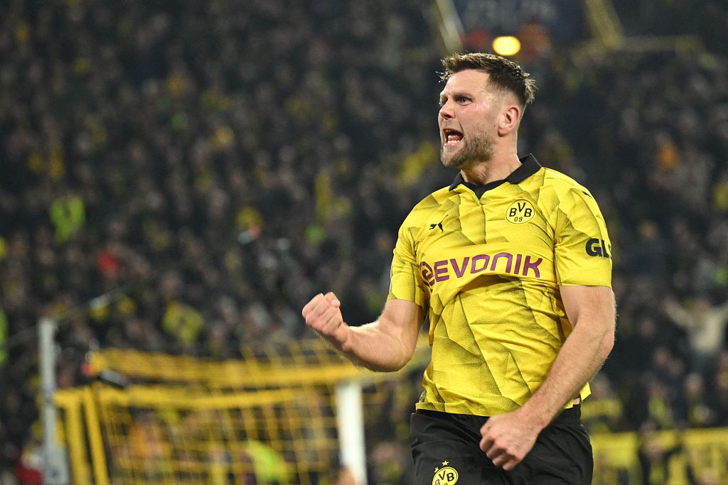 Dortmund's Niclas Fullkrug celebrates scoring his team's third goal  during their Champions League clash with Atletico Madrid in Barcelona, Spain, April 16, 2024. /CFP