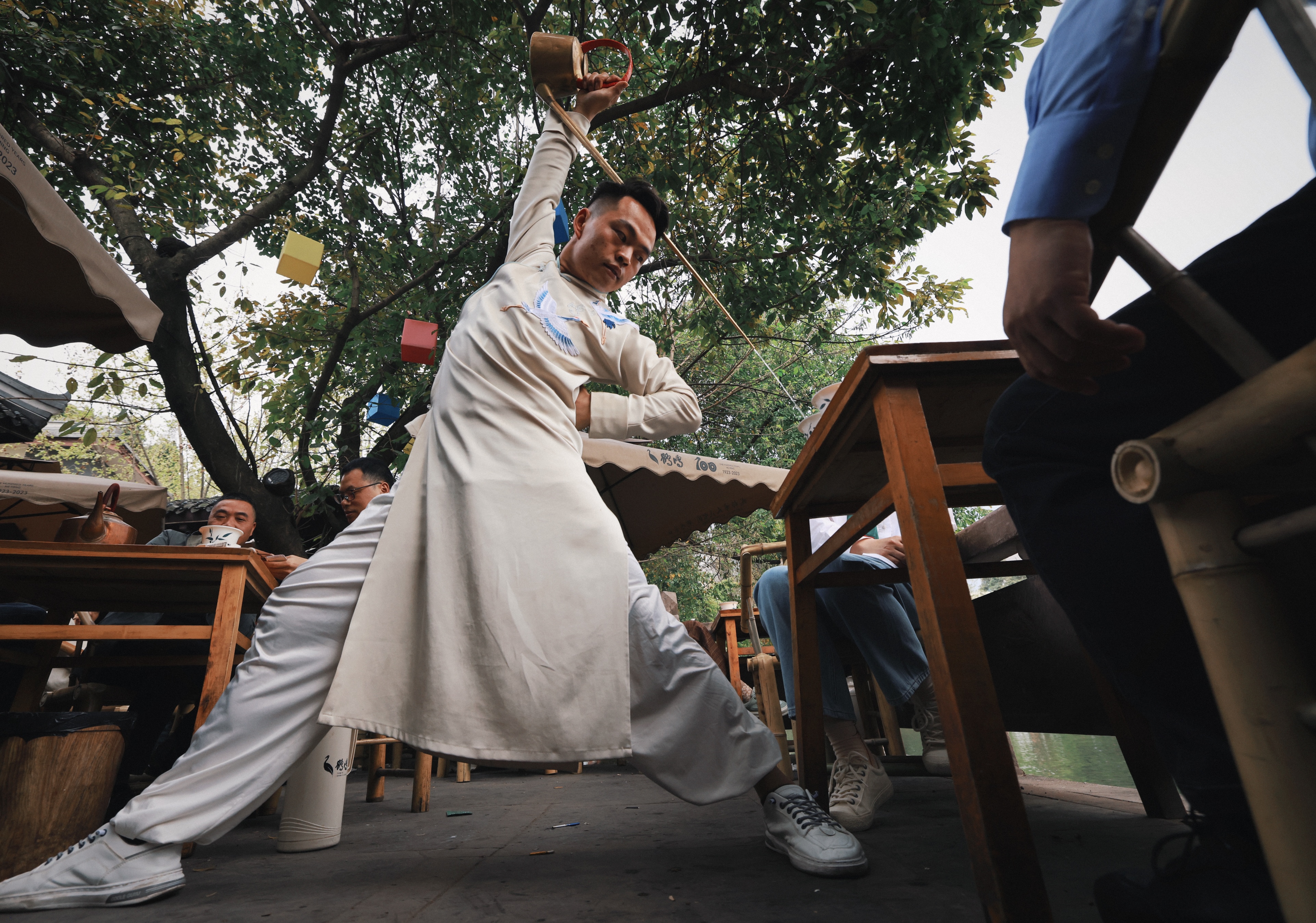 A tea sommelier displays his impressive skills at the Heming Teahouse in Chengdu in this photo taken in March 2024. /CGTN