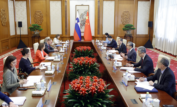 Chinese Foreign Minister Wang Yi, also a member of the Political Bureau of the Communist Party of China Central Committee, in discussion with Slovenia's Deputy Prime Minister and Foreign Minister Tanja Fajon in Beijing, China, April 17, 2024. /Chinese Foreign Ministry