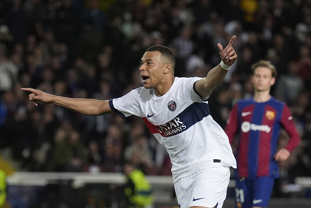 Kylian Mbappe of Paris Saint-Germain celebrates after scoring a goal in the second-leg game of the UEFA Champions League quarterfinals against Barcelona at the Estadi Olimpic Lluis Companys in Barcelona, Spain, April 16, 2024. /CFP