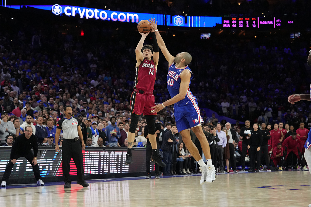 Nicolas Batum (#40) of the Philadelphia 76ers blocks a shot by Tyler Herro of the Miami Heat in the NBA Eastern Conference play-in tournament game at the Wells Fargo Center in Philadelphia, Pennsylvania, April 17, 2024. /CFP