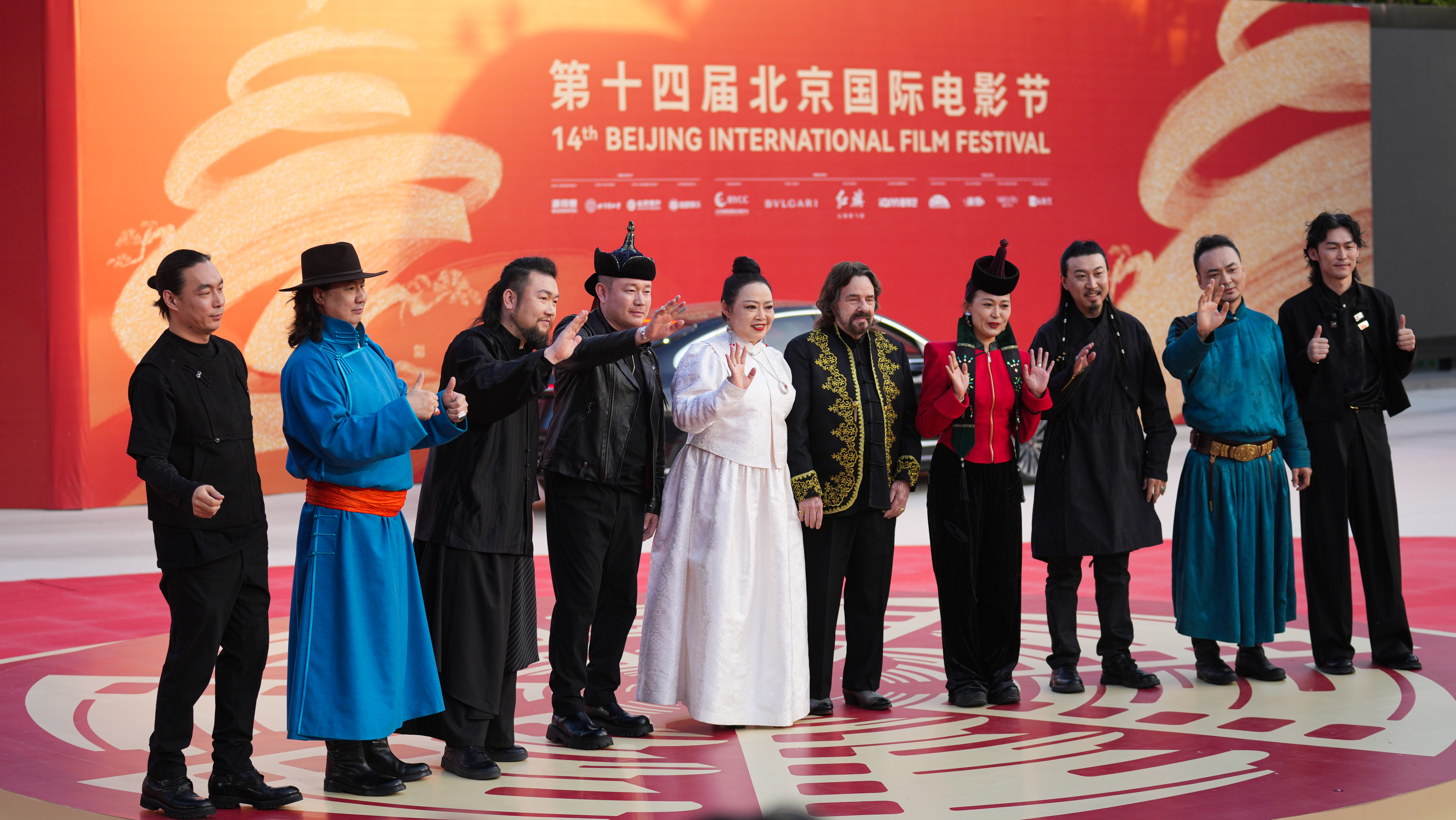 American singer Bertie Higgins and Chinese musicians on the red carpet at the opening ceremony of the 14th Beijing International Film Festival in Beijing, April 18, 2024. Chen Bo/CGTN