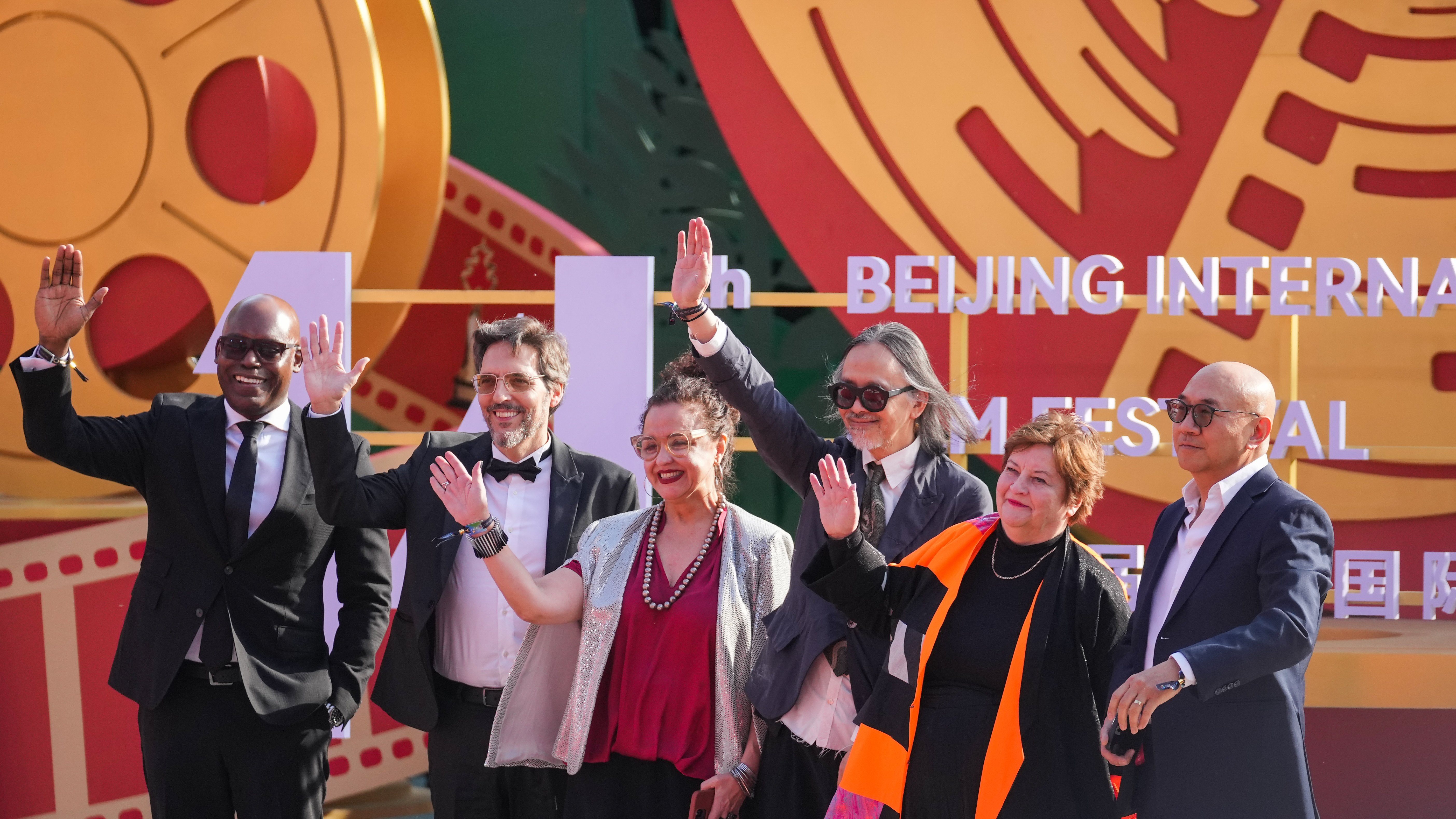 Professionals from abroad on the red carpet at the opening ceremony of the 14th Beijing International Film Festival in Beijing, April 18, 2024. Chen Bo/CGTN