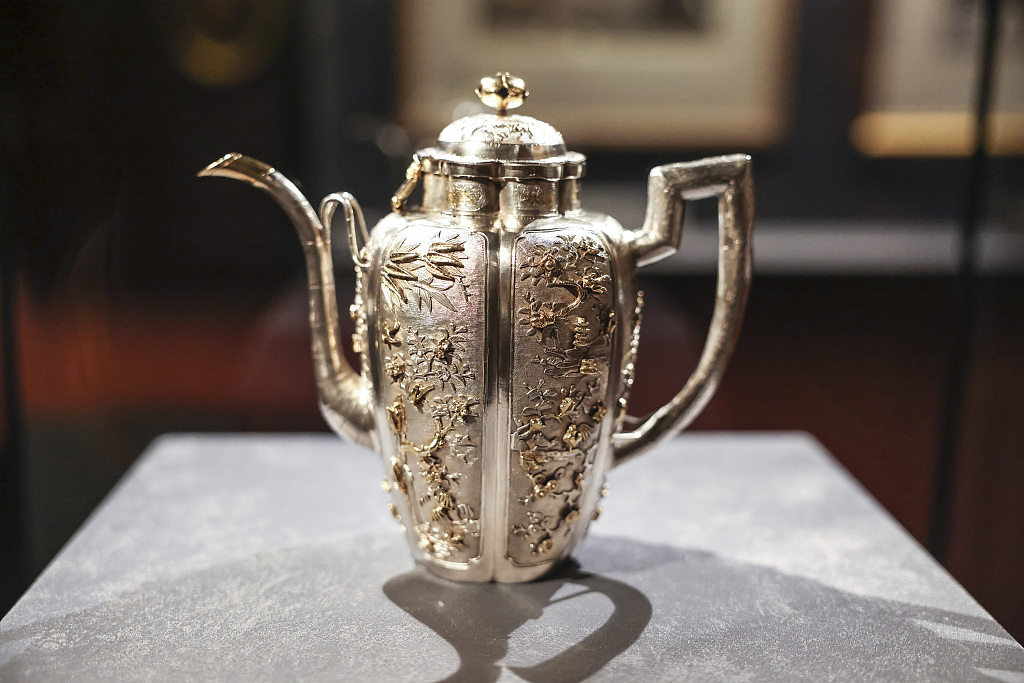 A silver-gilt kettle is displayed at the Palace Museum in Beijing on April 1, 2024. /CFP