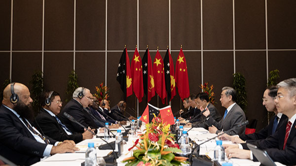 Chinese Foreign Minister Wang Yi, also a member of the Political Bureau of the Communist Party of China Central Committee, holds talks with Papua New Guinea's Foreign Minister Justin Tkachenko in Port Moresby, Papua New Guinea, April 20, 2024. /Chinese Foreign Ministry